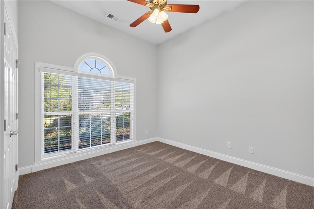 236 Reece Drive Hoschton, GA 30548 - Photo 22 of 58 an empty room with window