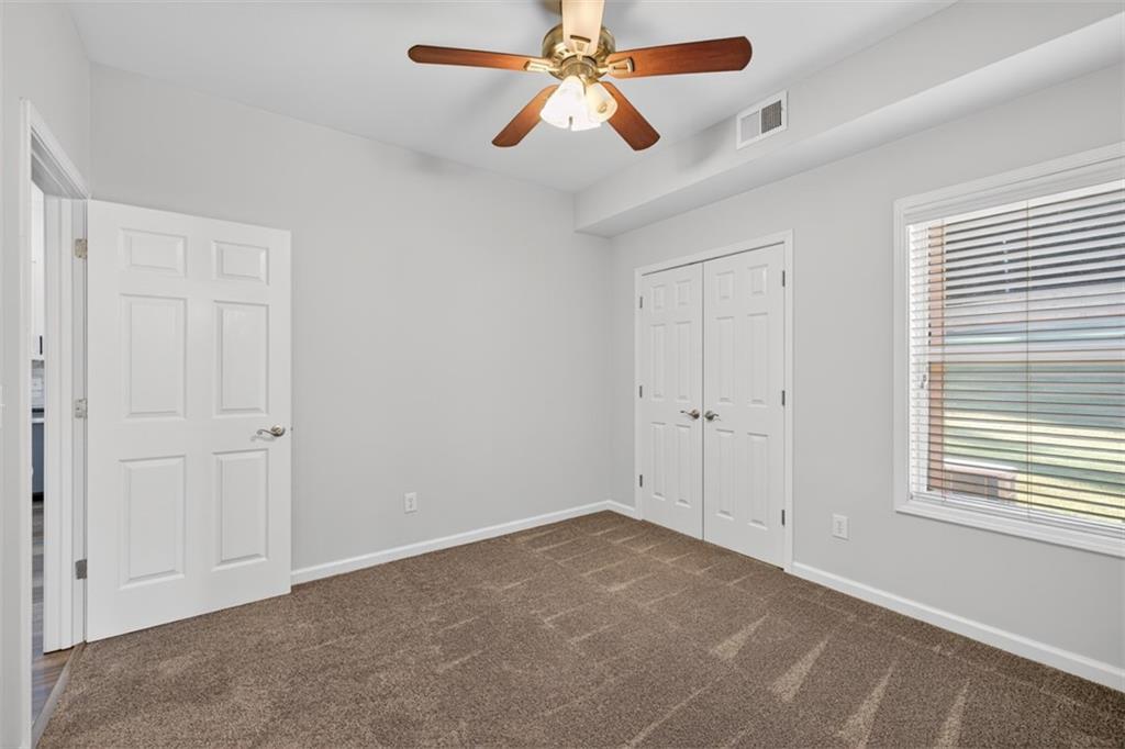 236 Reece Drive Hoschton, GA 30548 - Photo 24 of 58 a view of an empty room and window