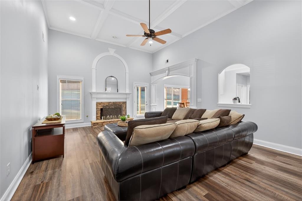 236 Reece Drive Hoschton, GA 30548 - Photo 53 of 58 a living room with furniture fireplace and a flat screen tv