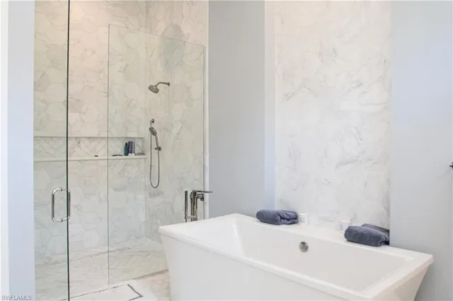 a bathroom with a white bath tub