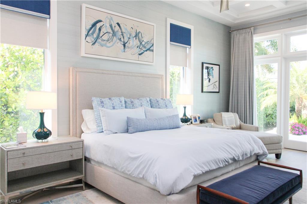 3123 Crayton Road Naples, FL 34103 - Photo 9 of 50 a bedroom with a bed and a window