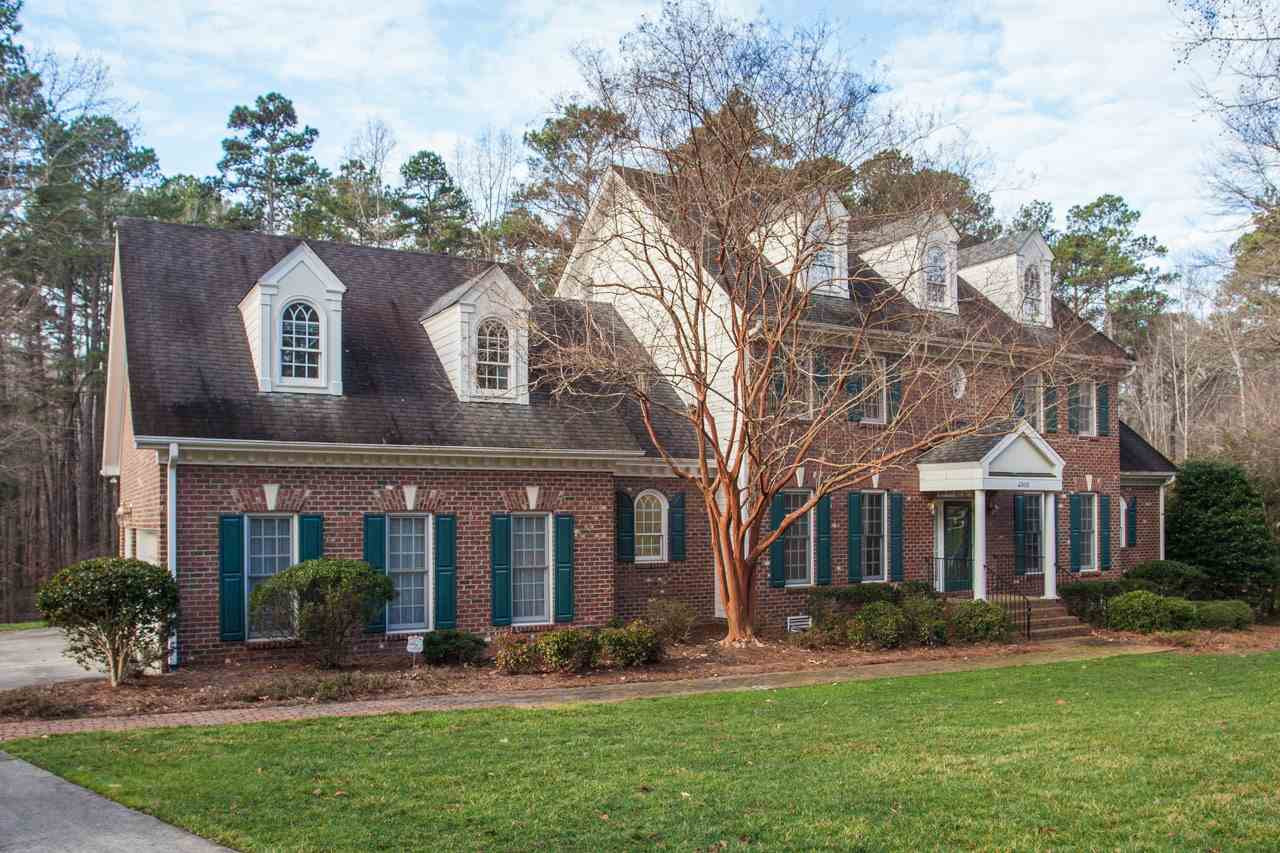 Gorgeous Custom three side brick colonial...Imagine how beautiful the trees will look when in bloom in a few weeks. Exterior Front