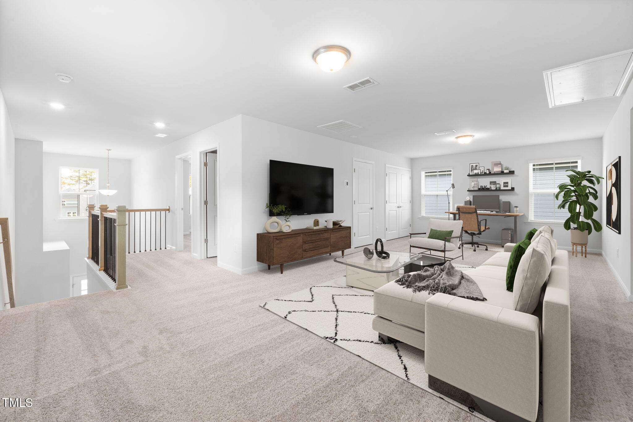 1382 Rowboat Road Apex, NC 27502 - Photo 9 of 19 a living room with furniture and a flat screen tv