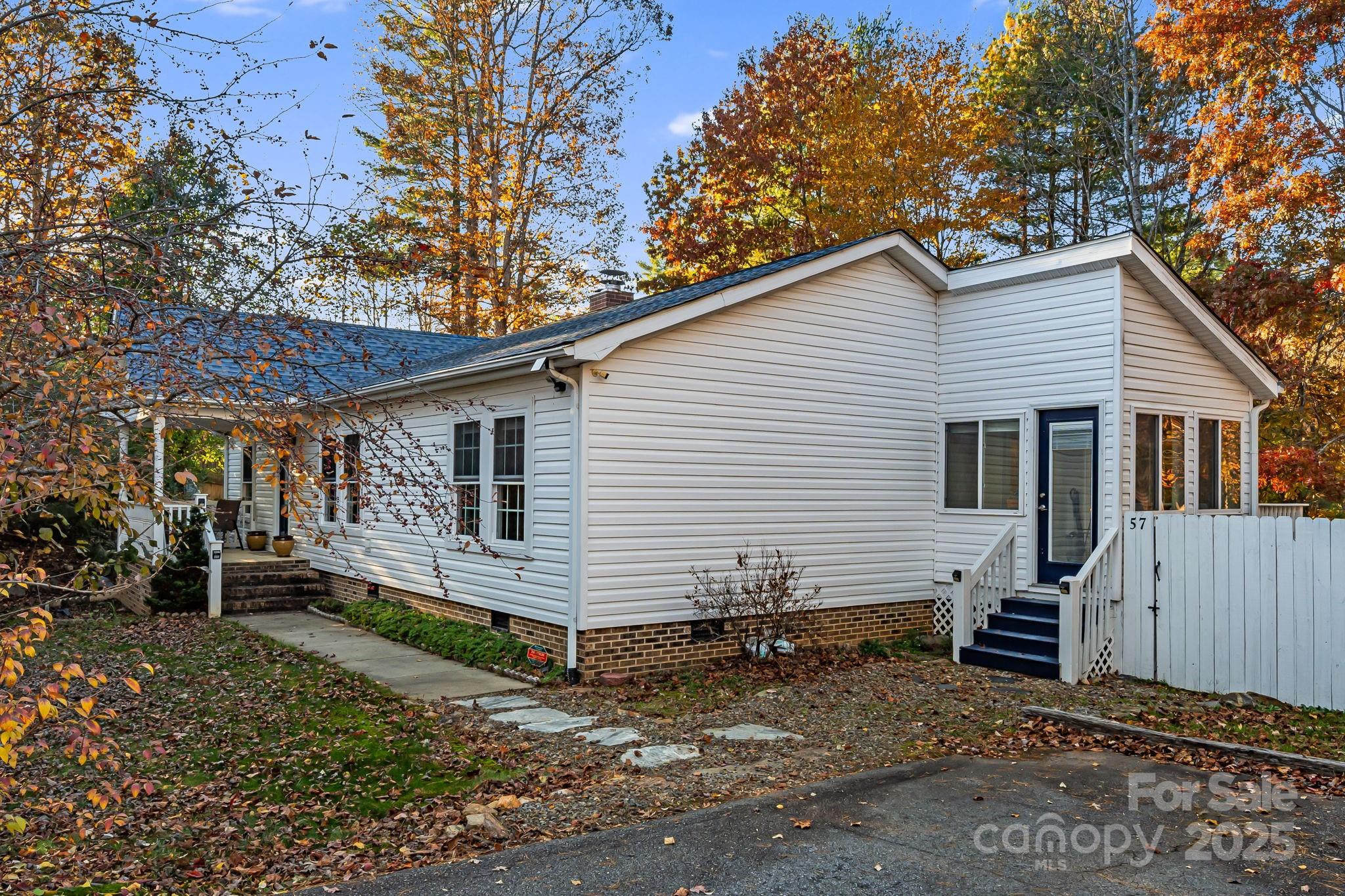 57 Founders Way Arden, NC 28704 - Photo 2 of 26 a view of a house with a yard