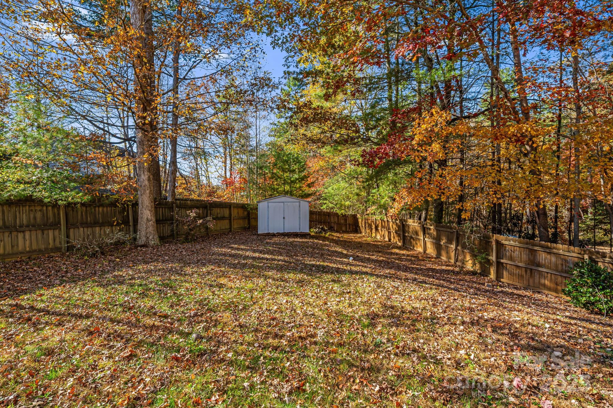 57 Founders Way Arden, NC 28704 - Photo 21 of 26 a view of a yard with wooden fence