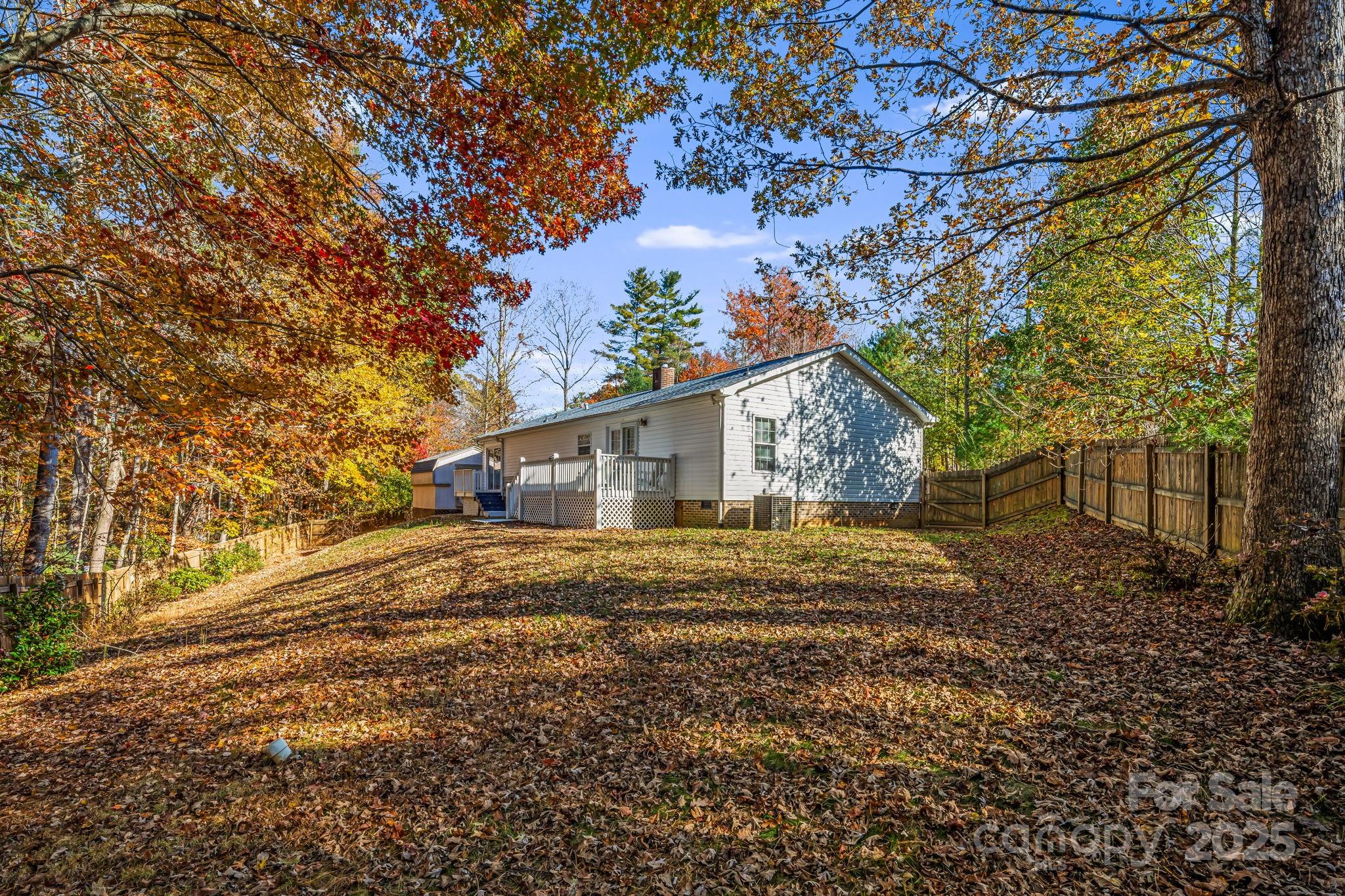 57 Founders Way Arden, NC 28704 - Photo 22 of 26 a view of a house with a tree in the yard