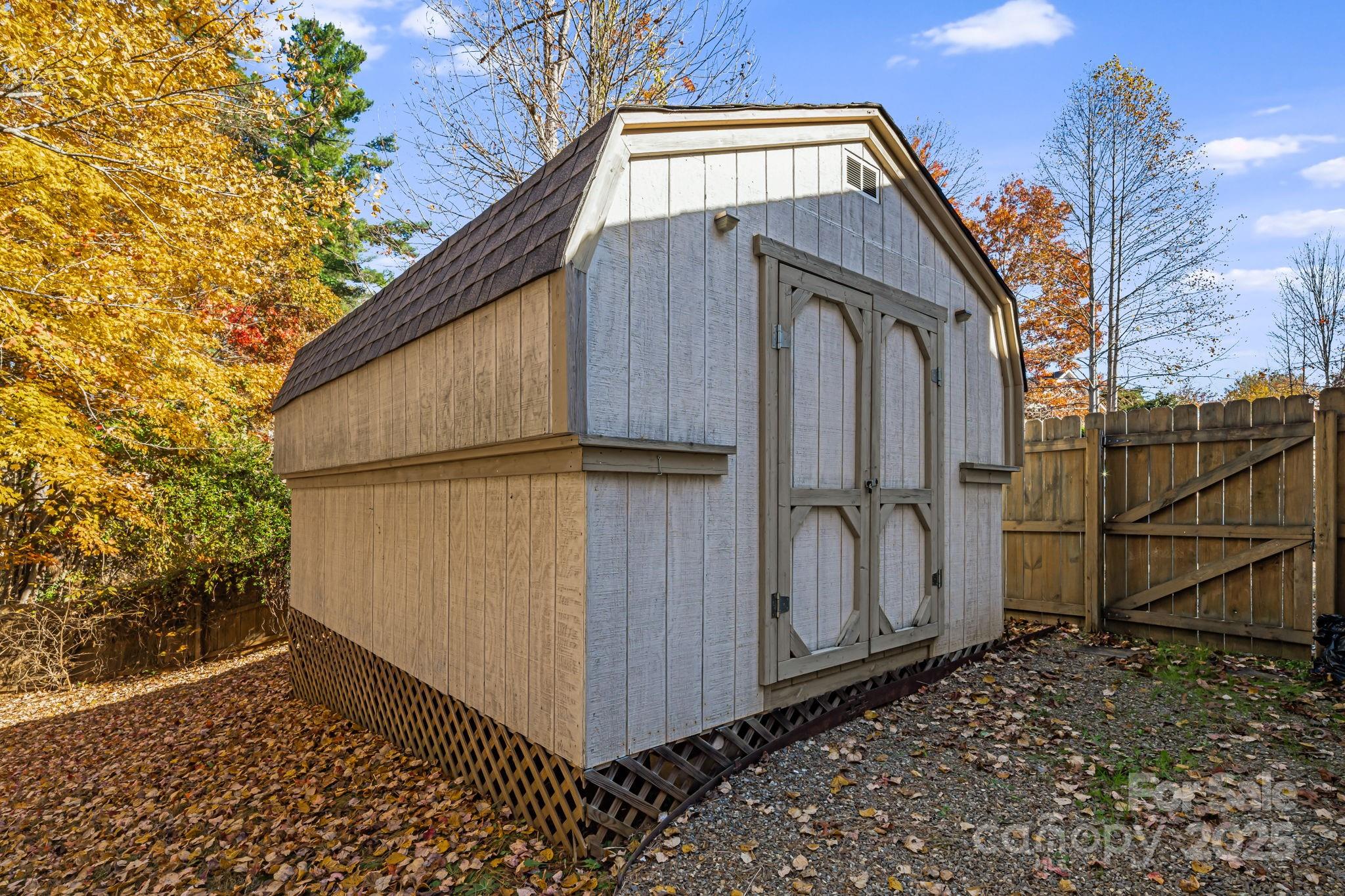 57 Founders Way Arden, NC 28704 - Photo 23 of 26 a view of a house with a wooden door