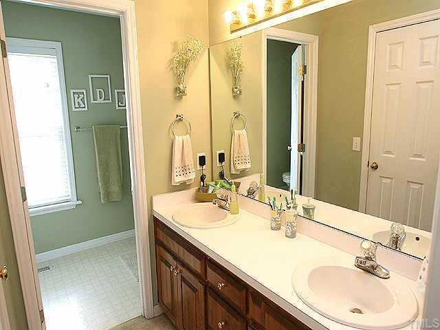 6424 Tinderbox Lane Raleigh, NC 27603 - Photo 9 of 10 Master bath has large walk in closet and dual vanities!