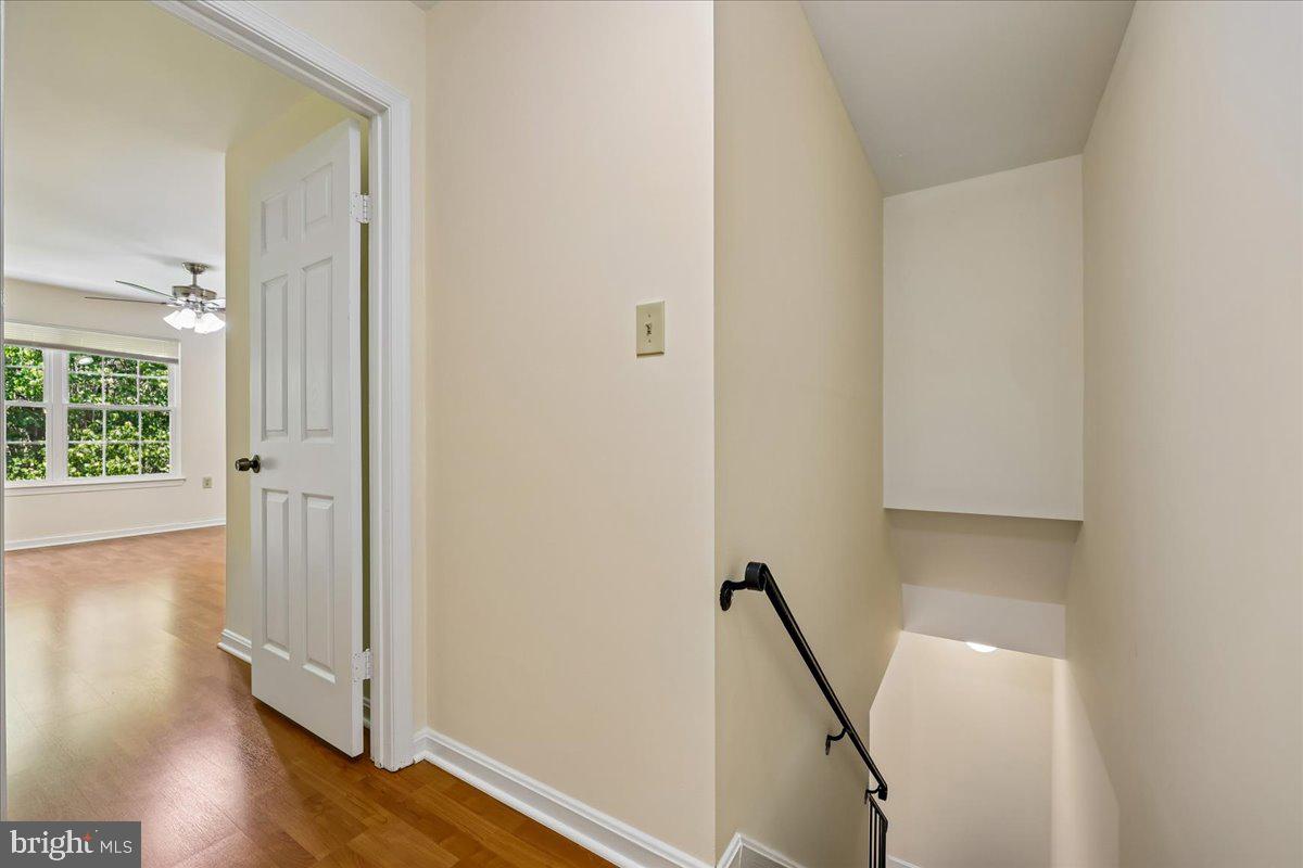 18012 Golden Spring Court, Unit 239 Olney, MD 20832 - Photo 18 of 44 a view of an entryway with wooden floor