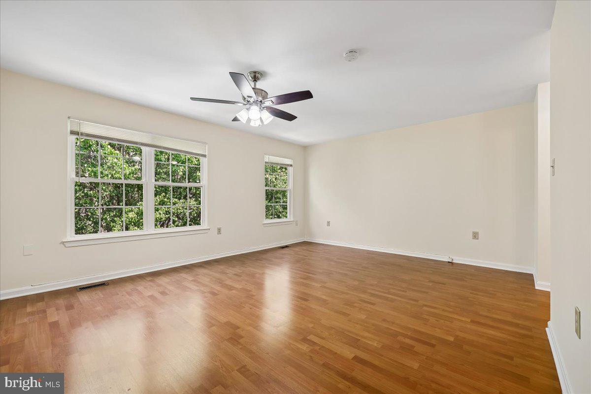 18012 Golden Spring Court, Unit 239 Olney, MD 20832 - Photo 20 of 44 a view of an empty room with a window