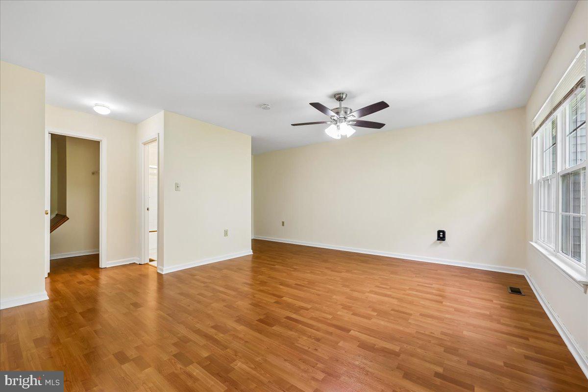 18012 Golden Spring Court, Unit 239 Olney, MD 20832 - Photo 22 of 44 a view of an empty room with a window