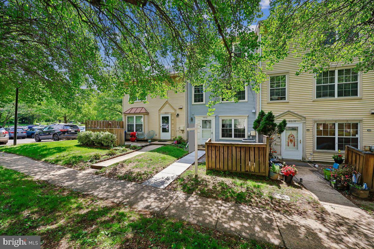 18012 Golden Spring Court, Unit 239 Olney, MD 20832 - Photo 3 of 44 a front view of a house with garden