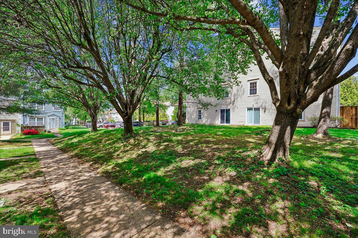 18012 Golden Spring Court, Unit 239 Olney, MD 20832 - Photo 4 of 44 a house view with a garden