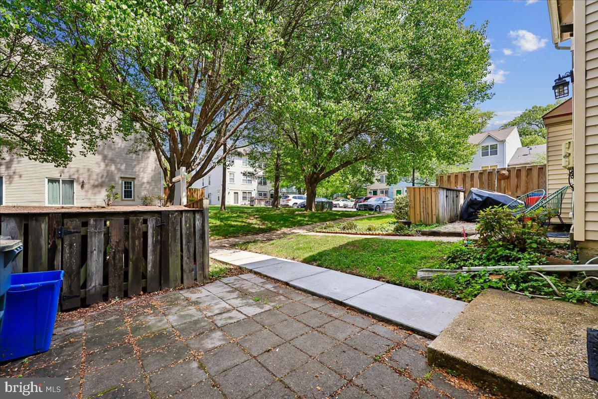 18012 Golden Spring Court, Unit 239 Olney, MD 20832 - Photo 6 of 44 a view of a house with backyard and garden