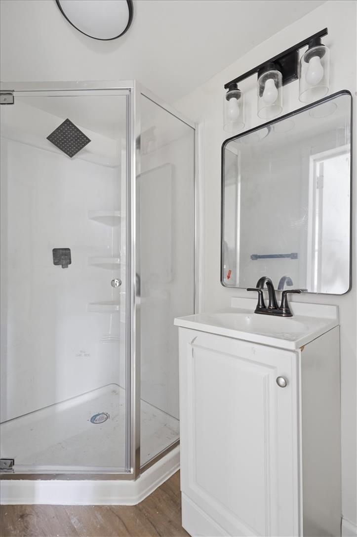 812 Linden Street Bethlehem, PA 18018 - Photo 32 of 39 A well-appointed bath features a shower with a sleek glass enclosure and a convenient vanity.