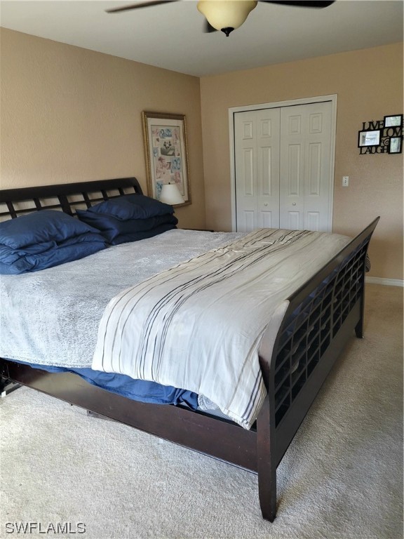 17520 Braddock Road Fort Myers, FL 33967 - Photo 14 of 31 a bedroom with a bed and window