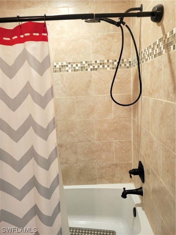 17520 Braddock Road Fort Myers, FL 33967 - Photo 22 of 31 a bathroom with a shower