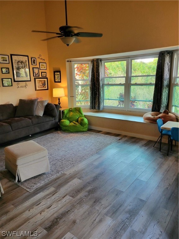 17520 Braddock Road Fort Myers, FL 33967 - Photo 4 of 31 a living room with furniture and a large window