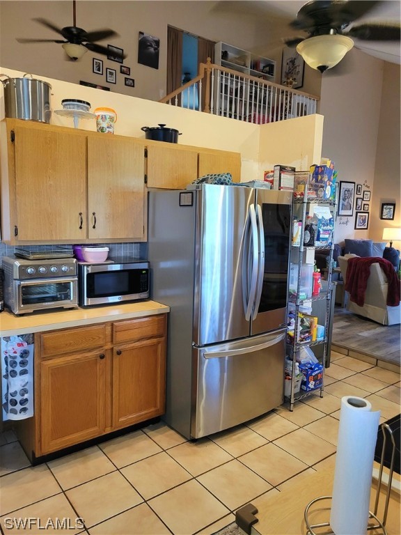 17520 Braddock Road Fort Myers, FL 33967 - Photo 6 of 31 a kitchen with stainless steel appliances granite countertop a refrigerator and a stove
