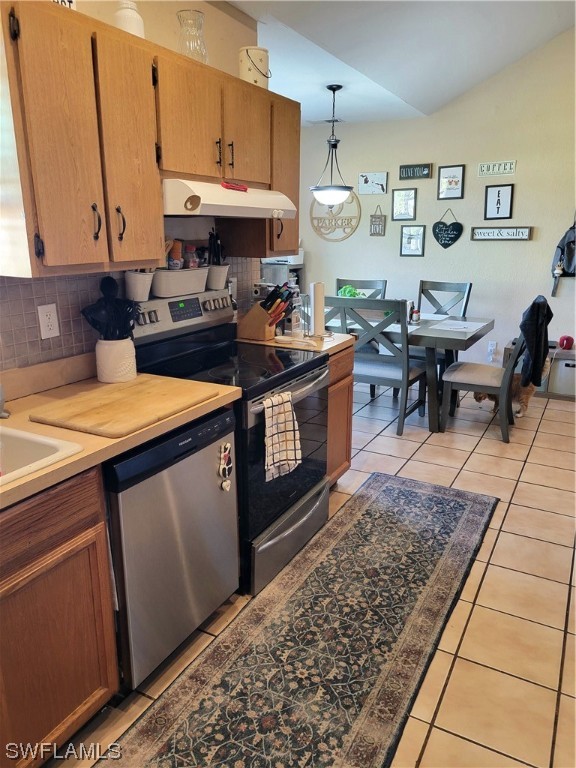 17520 Braddock Road Fort Myers, FL 33967 - Photo 8 of 31 a open kitchen with stainless steel appliances granite countertop a sink dishwasher stove and cabinets