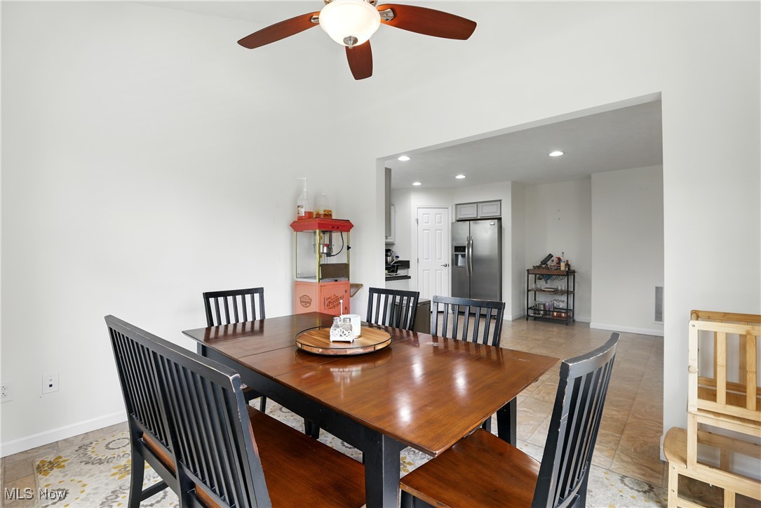 2112 Fowl Road Elyria, OH 44035 - Photo 19 of 49 Dining area with ceiling fan, recessed lighting, and light tile patterned floors