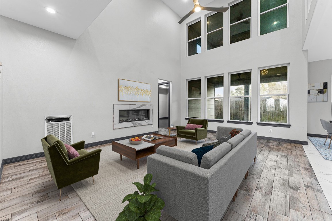 5215 Kelso Street Houston, TX 77021 - Photo 19 of 47 a living room with furniture and a flat screen tv