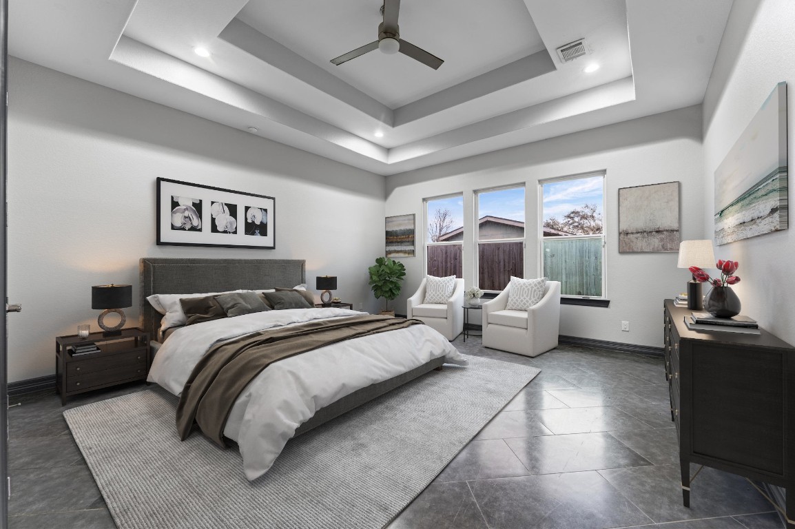 5215 Kelso Street Houston, TX 77021 - Photo 35 of 47 a spacious bedroom with a bed and furniture