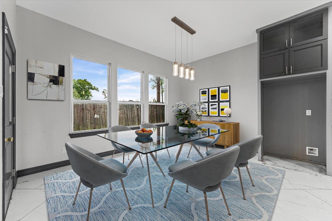 5215 Kelso Street Houston, TX 77021 - Photo 7 of 47 a dining room with furniture and window