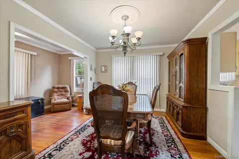 a kitchen with a stove a sink and a cabinets