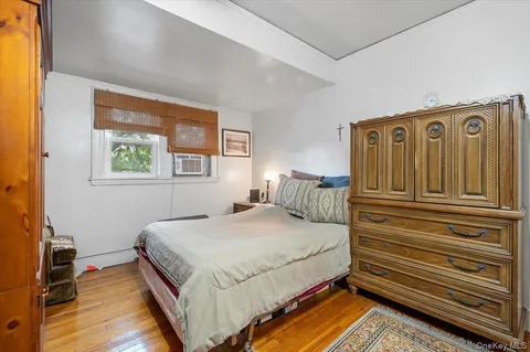a bed sitting in a bedroom next to a wooden building