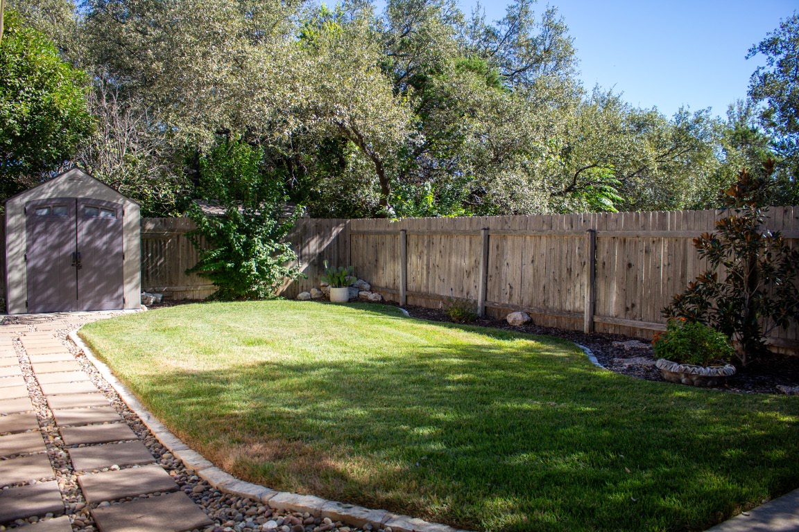 12721 Oxen Way Austin, TX 78732 - Photo 25 of 37 a view of a backyard