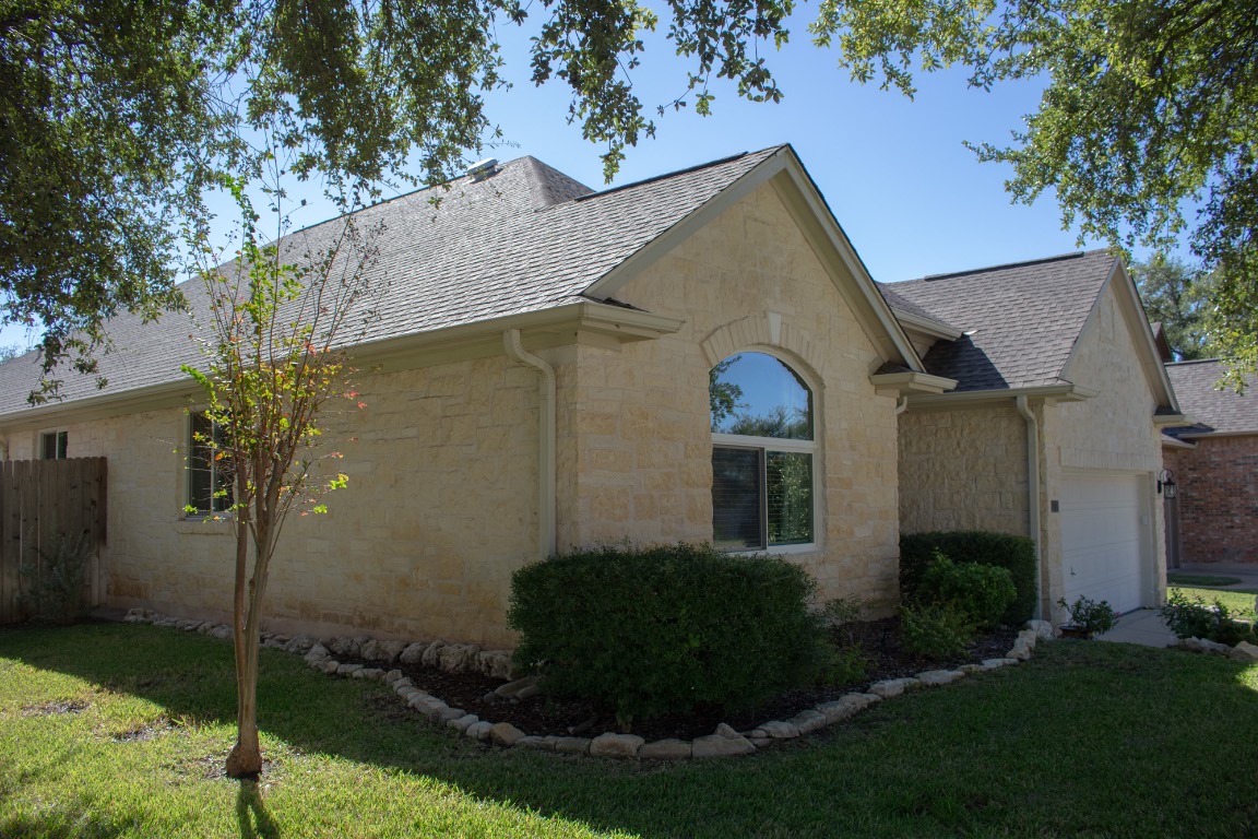 12721 Oxen Way Austin, TX 78732 - Photo 30 of 37 a view of a back yard of the house