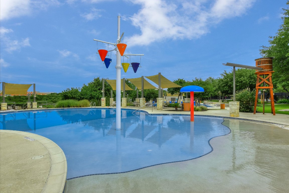 12721 Oxen Way Austin, TX 78732 - Photo 36 of 37 swimming pool view with a garden