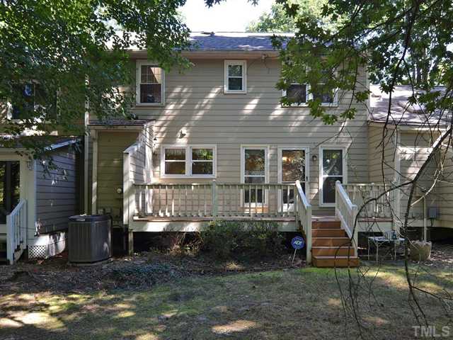 909 Bridge Way Raleigh, NC 27615 - Photo 19 of 22 a front view of a house with a yard