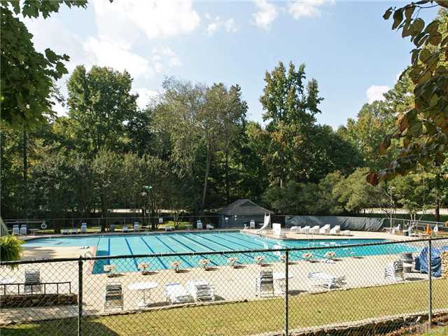 909 Bridge Way Raleigh, NC 27615 - Photo 21 of 22 a view of swimming pool with seating space