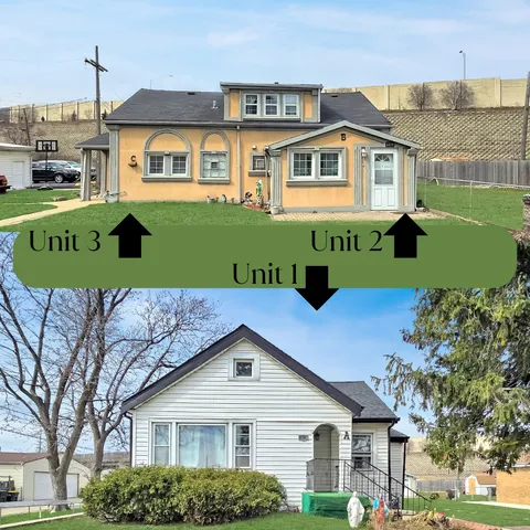 a front view of a house with a garden and plants