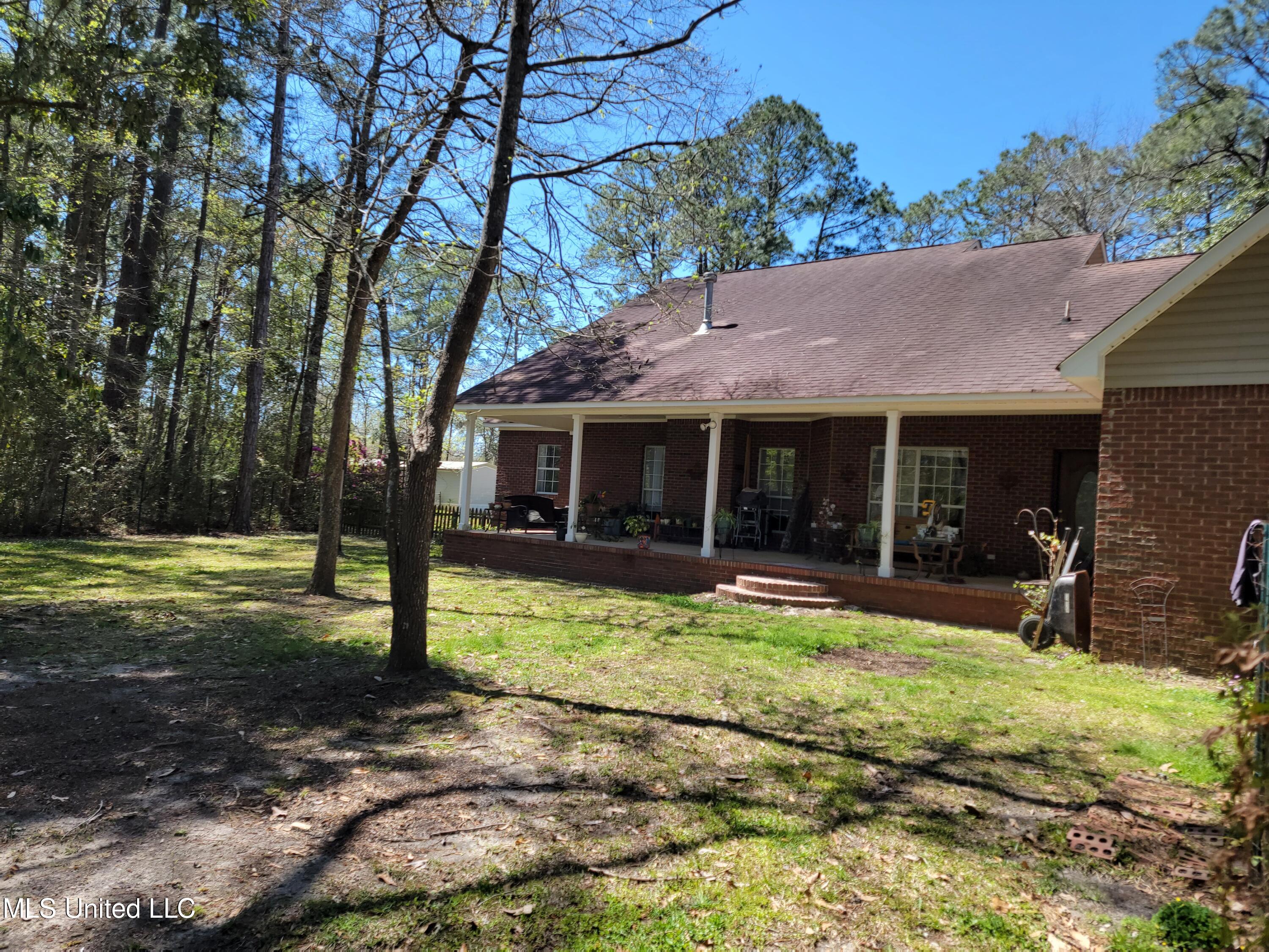 5540 Roxane Street Gautier, MS 39553 - Photo 30 of 35 Covered Back Porch