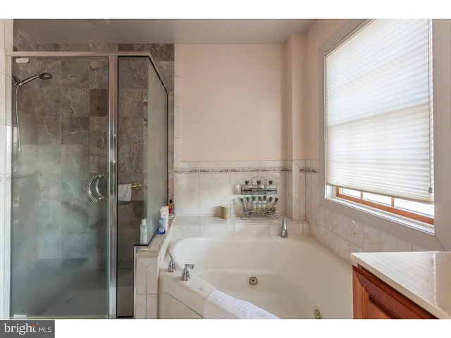 a bathroom with a sink and a bathtub