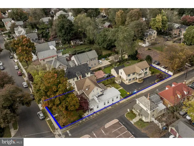 a view of a yard with an outdoor seating