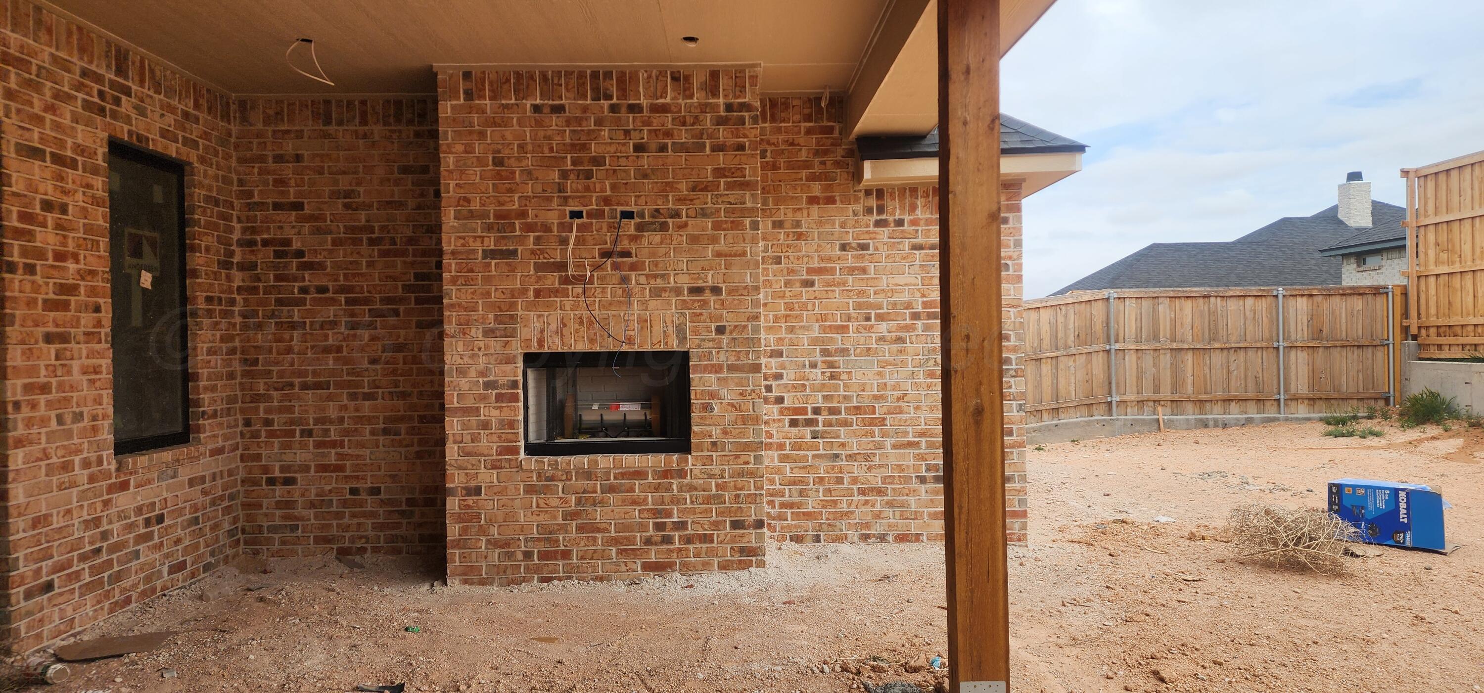 1104 Herring Ranch Road Amarillo, TX 79124 - Photo 10 of 12 Back Patio Fireplace