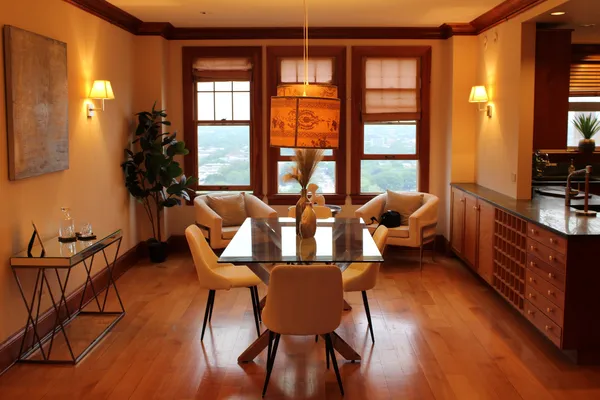 a view of a dining room with furniture window and outside view
