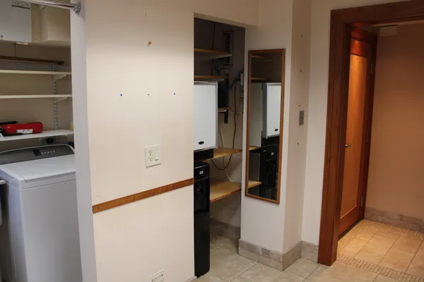 a view of storage and utility room in empty room