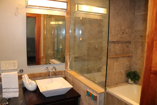 a bathroom with a bathtub and a sink