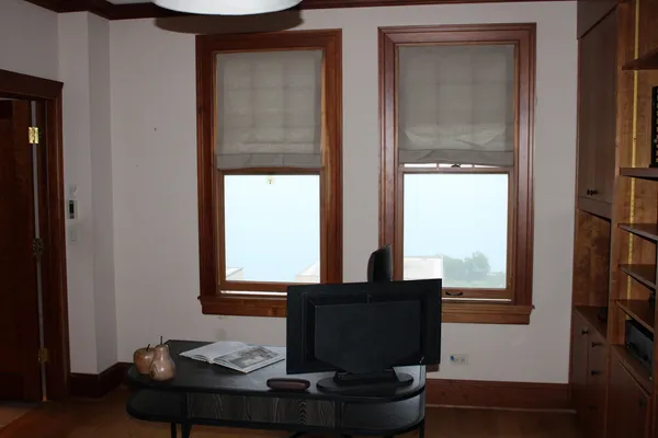 a living room with furniture and window