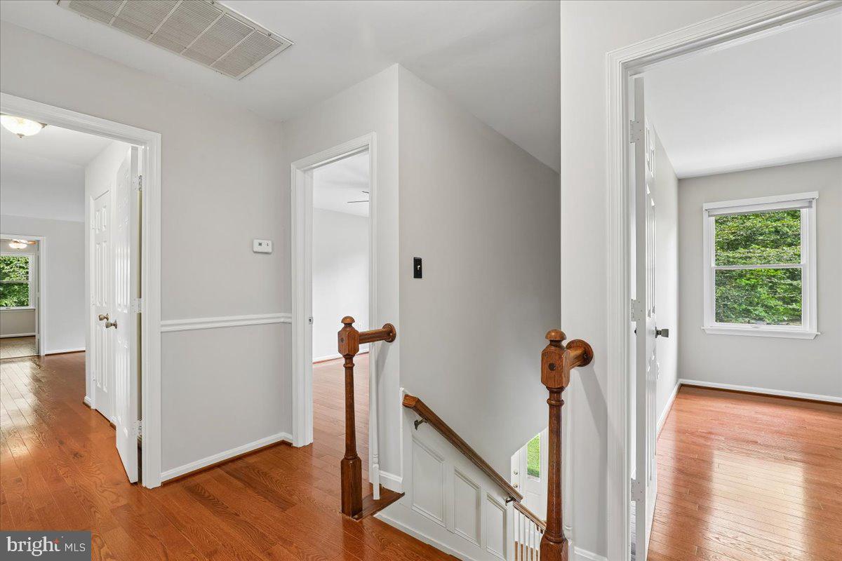 8253 Honeysuckle Road Manassas, VA 20112 - Photo 66 of 112 Bright second floor hallway.