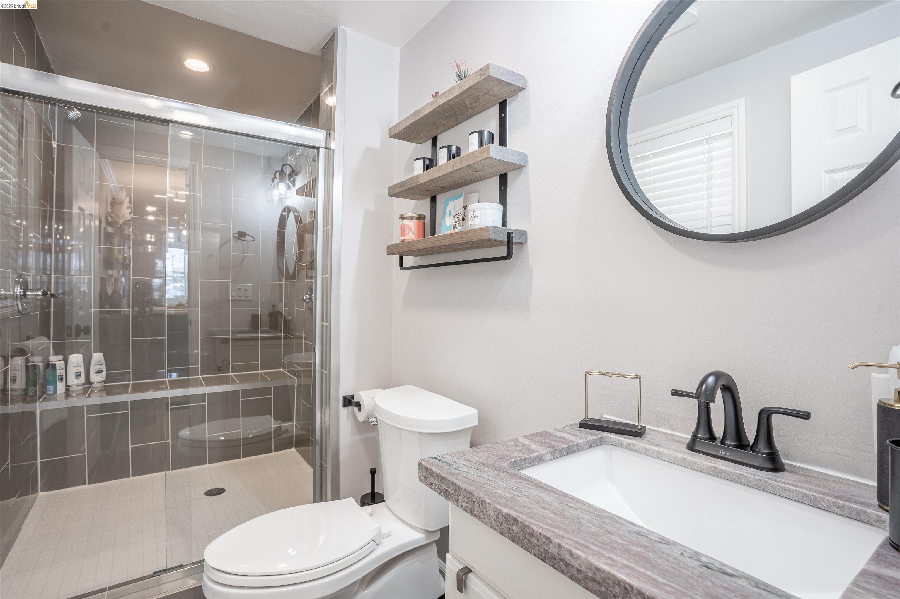 527 Chester Street Oakland, CA 94607 - Photo 15 of 47 525 (Downstairs) Bathroom with vanity and a shower stall