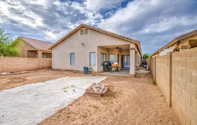 a bathroom with a sink and a yard