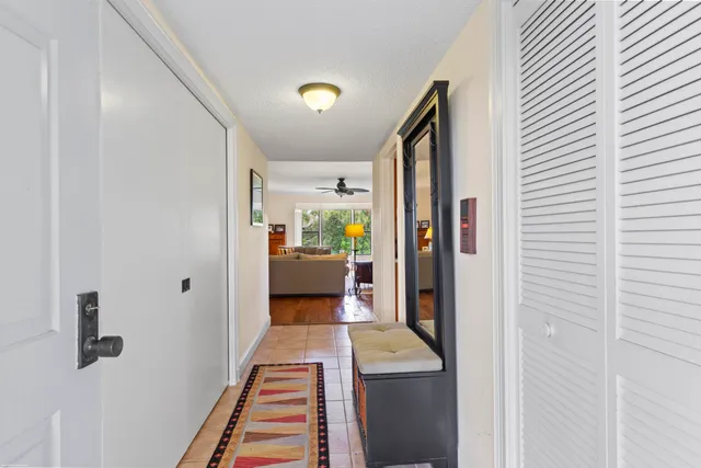 a living room with furniture and a gate
