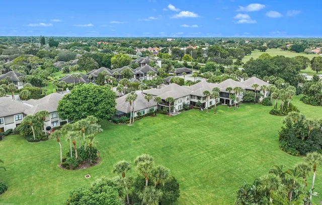 a view of a yard with a lake view