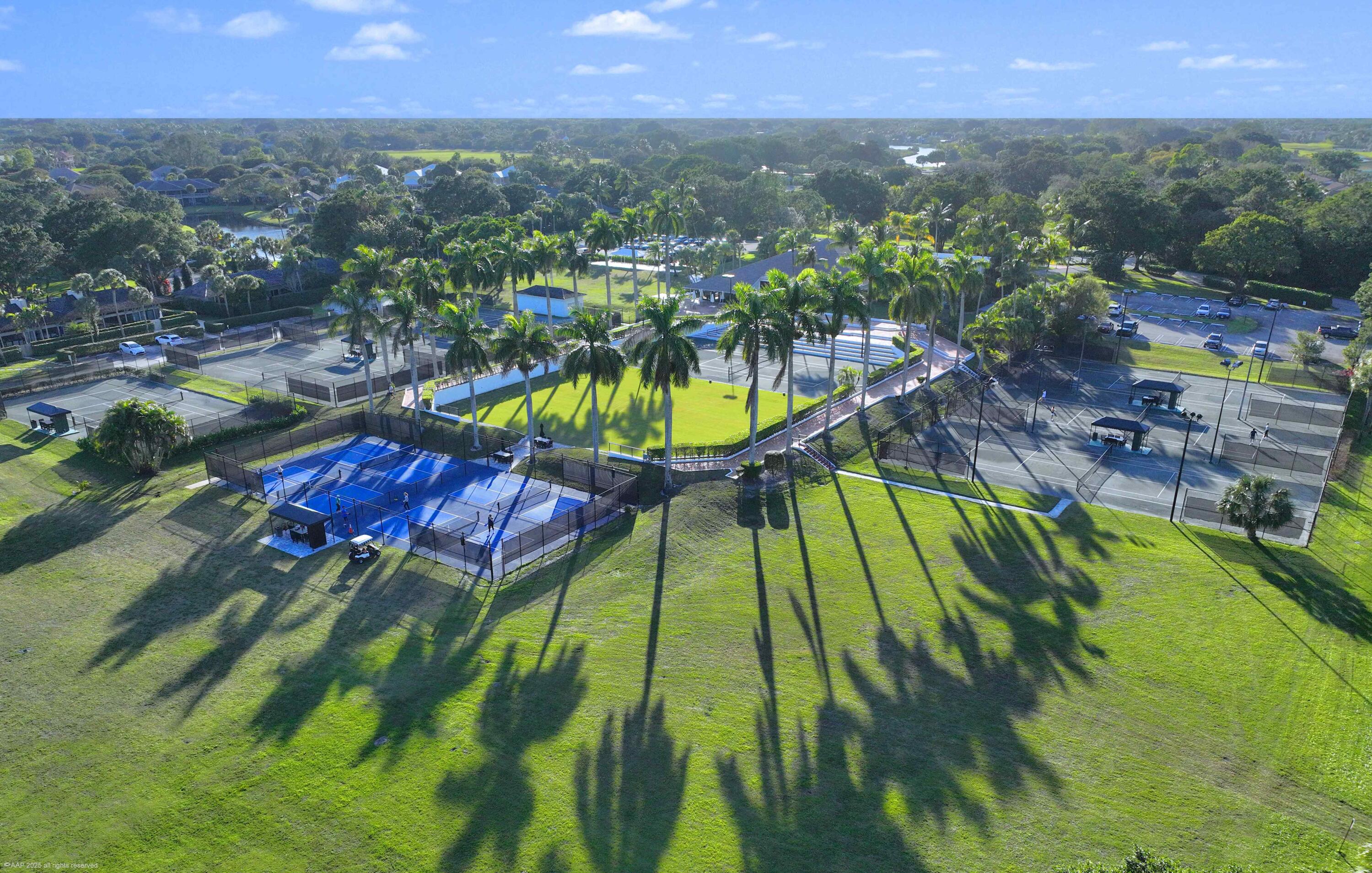 13244 Polo Club Road, Unit C206 Wellington, FL 33414 - Photo 44 of 46 a view of an outdoor space pool patio and lake view